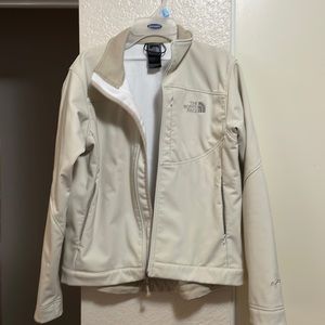 Beige north face jacket